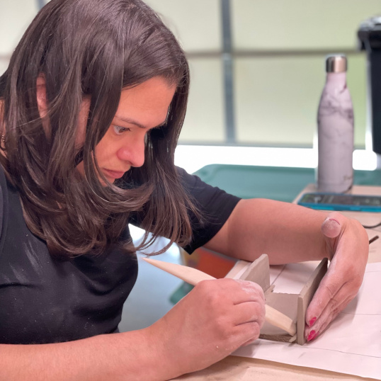 Hand-built ceramic art by Emily.